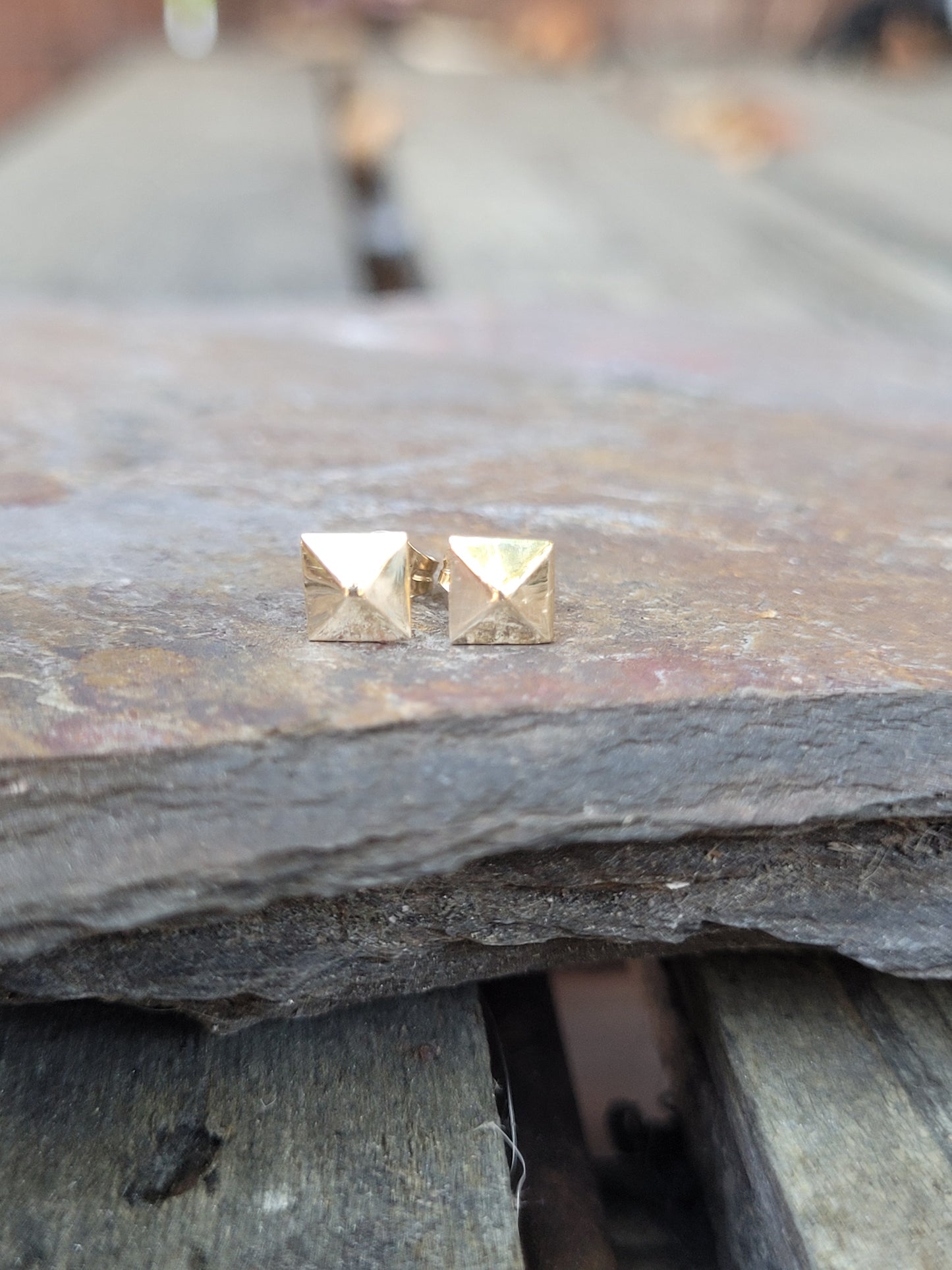14k gold pyramid shape stud earrings. Sterling silver stud earrings