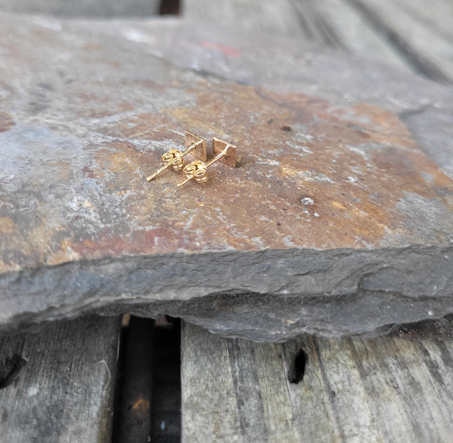 14k gold pyramid shape stud earrings. Sterling silver stud earrings