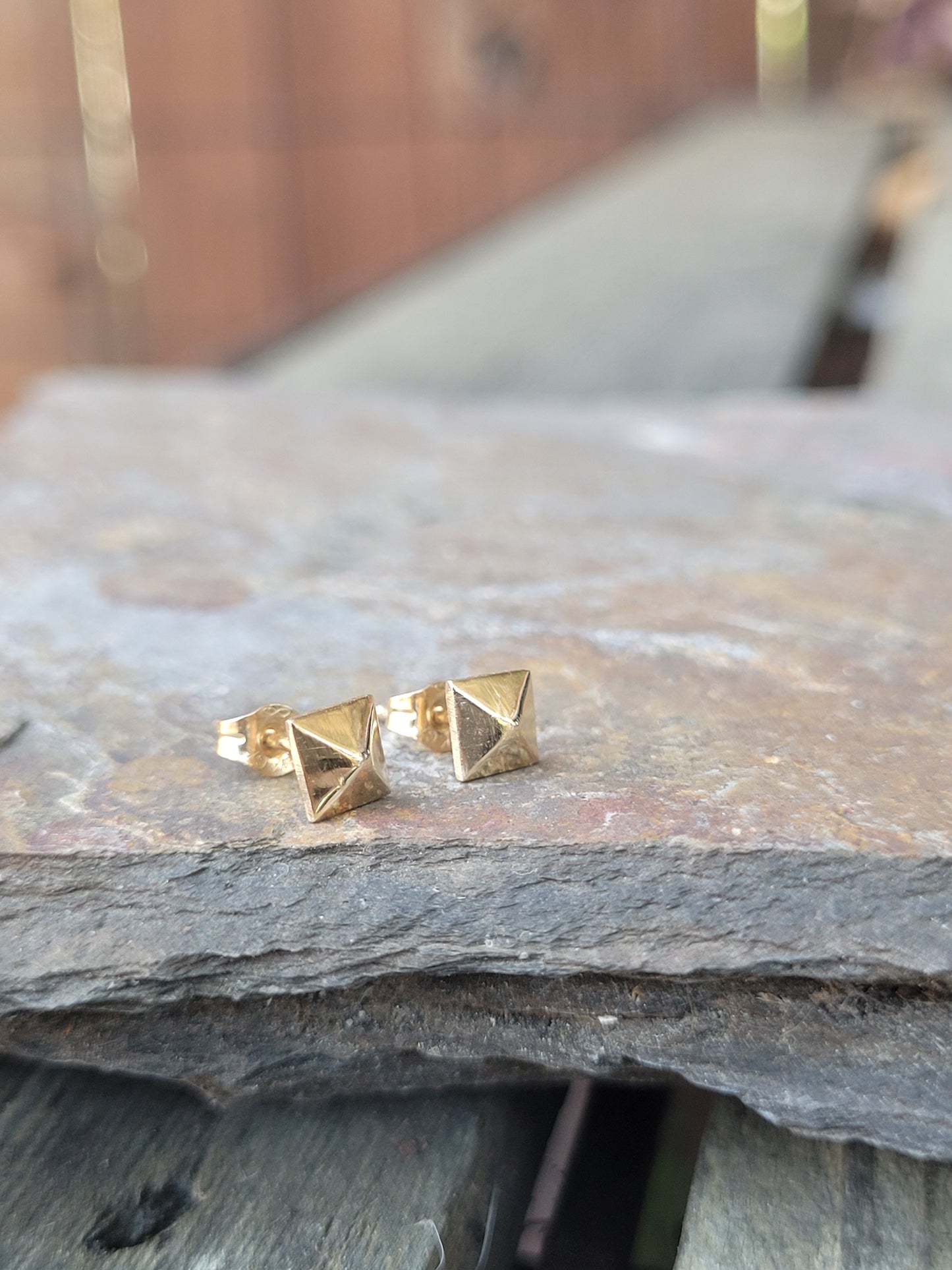 14k gold pyramid shape stud earrings. Sterling silver stud earrings